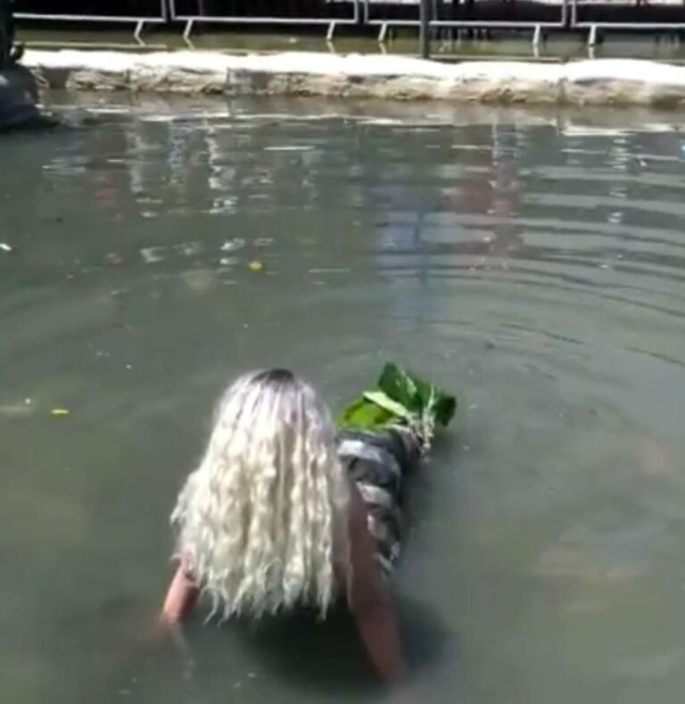 Pabllo se veste de sereia para ensaio fotográfico na cheia de Manaus; veja vídeo