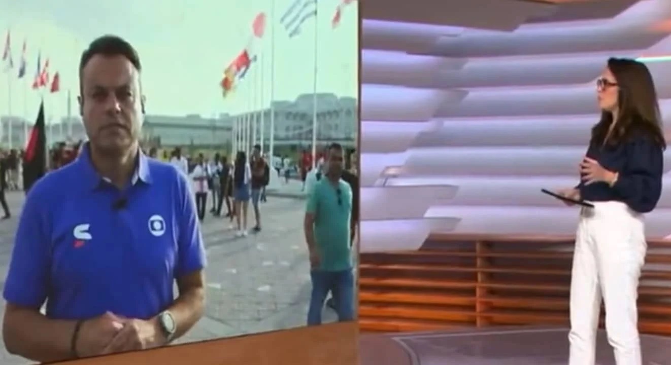 Vídeo: Jornalista global não percebe que está no ar, fecha cara e empurra torcedor