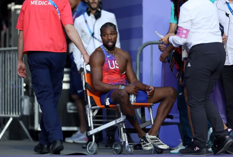 Americano corre com Covid, leva o bronze e sai de cadeira de rodas
