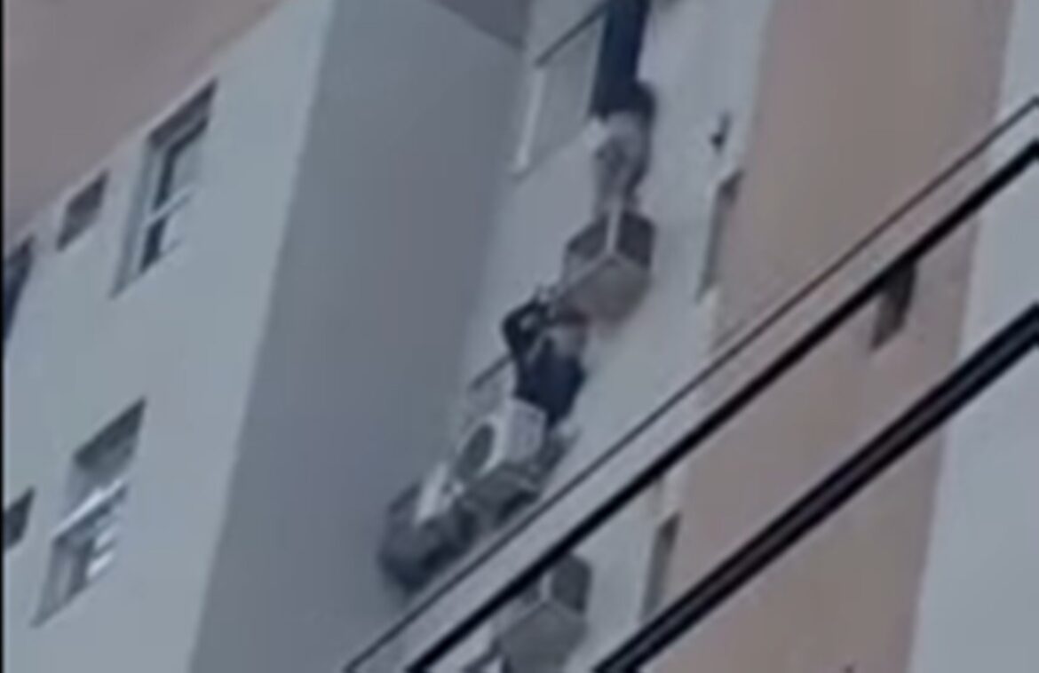 em-incendio,-mulher-se-pendura-no-ar-condicionado-e-salva-mae-e-filha