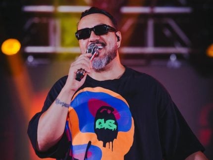 apos-internacao-de-xanddy-harmonia,-belo-substitui-cantor-em-show-no-rj