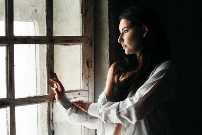 1 Beautiful Girl Stands Near Window 65906343