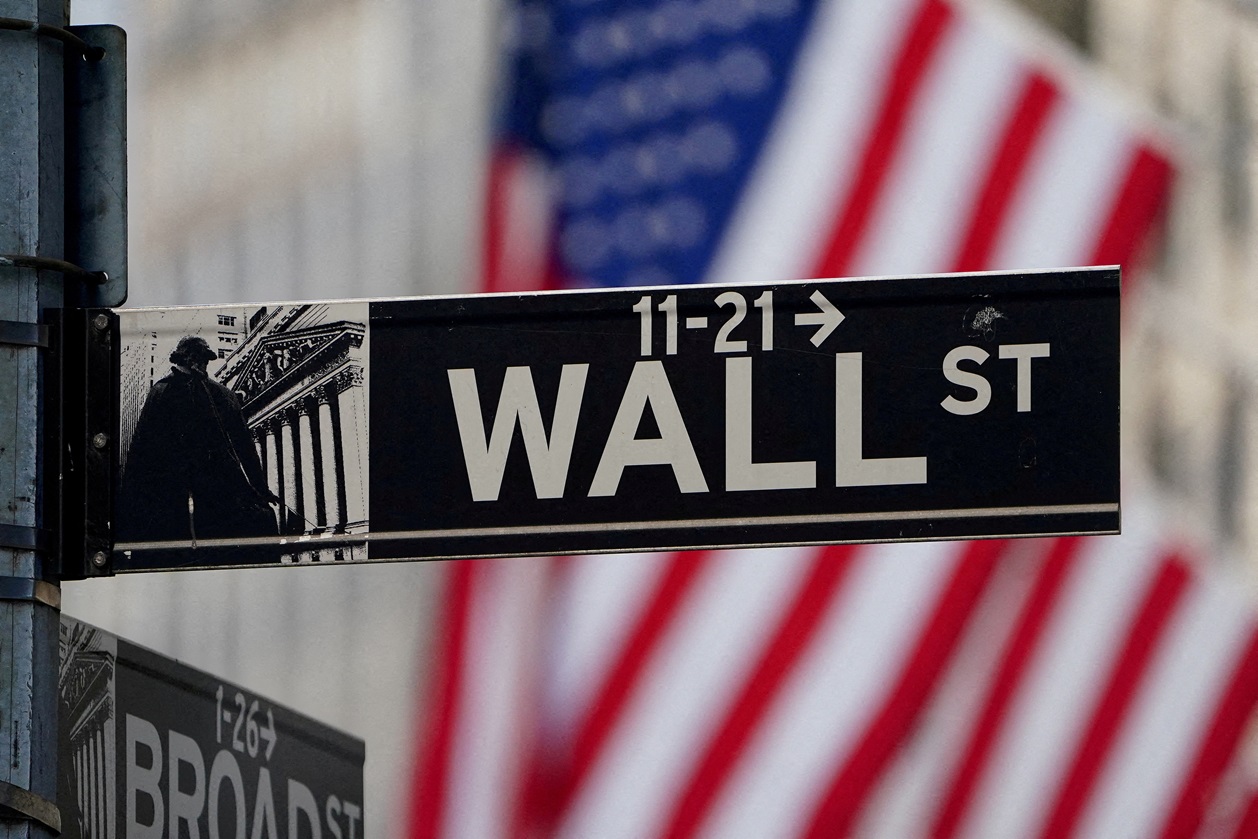 FILE PHOTO: The Wall Street Sign Is Pictured At The New York Stock Exchange (NYSE) In The Manhattan Borough Of New York City