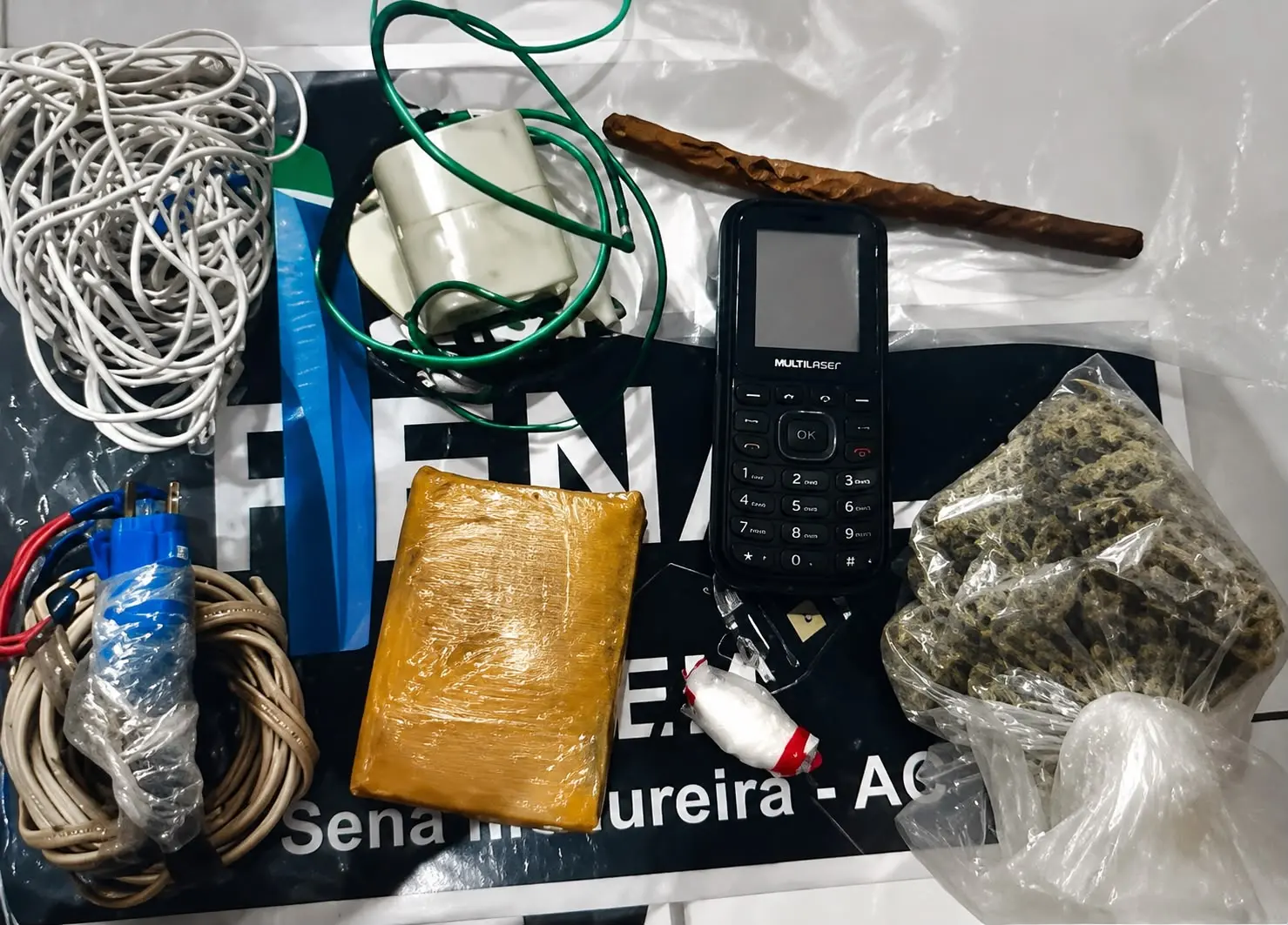 Detento é flagrado com droga, celular e carregador em cela de presídio