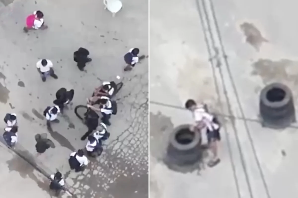 Imagens mostram alunos ao redor de traficante armado e montando barricadas